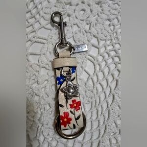 Coach Keychain with Red and Blue Flowers